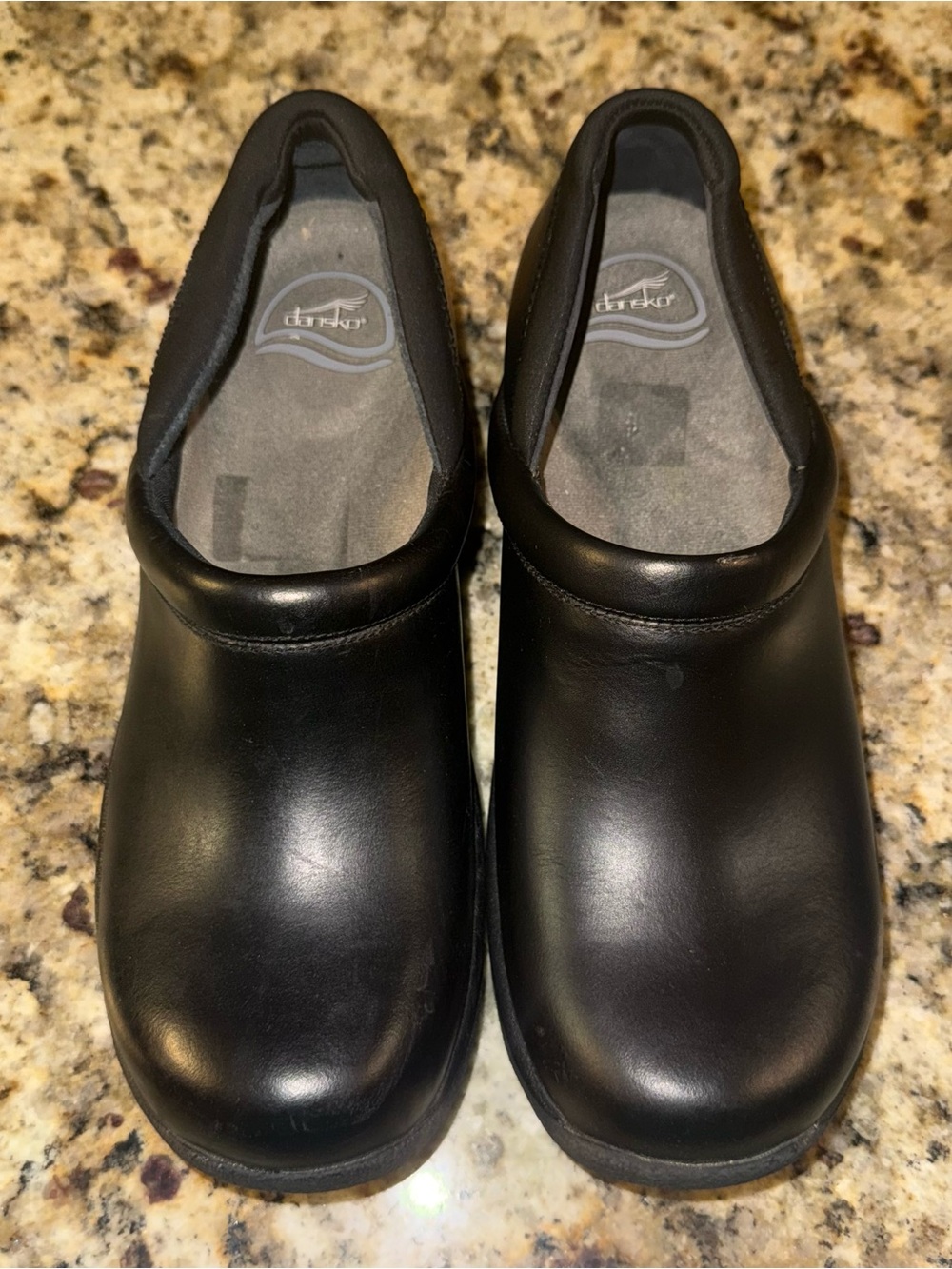 Dansko Black Slip-On Leather Clogs